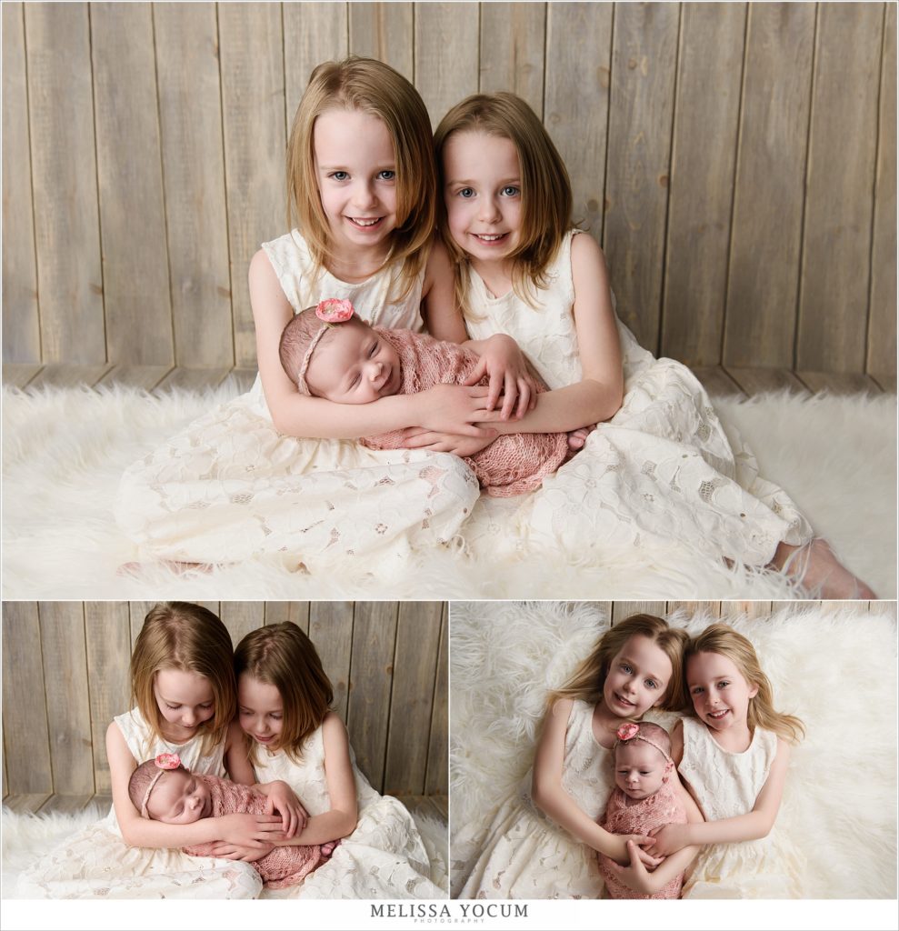 Twin sisters with newborn sister, newborn sibling photo